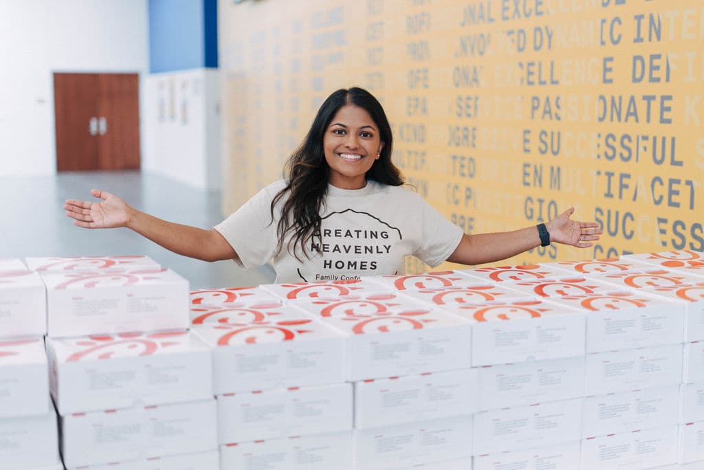 Church volunteer Jessica preparing Chick-fil-A food for Family Conference attendees